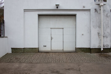 Rolling garage doors in white