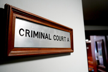 Sign for a criminal courtroom in the courthouse