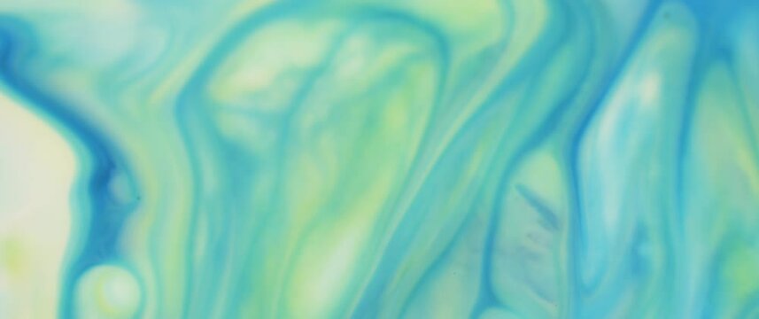 Macro Textures with Vibrant Neon Color Palette. Abstract Background Made with Oil Mixed with Green and Teal Dye, Ink, and Paint.