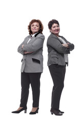 two mature women in casual clothes looking at you.