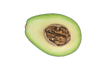 Avocado and walnuts isolated on white - foods rich in good oils. Food concept: walnut in avocado