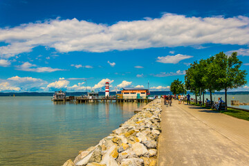 view of lakeside promenade of the austrian town podersdorf am see situated on shore of...