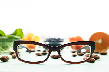 Modern fashionable corrective optical  glasses close-up against the background of that improve vision.