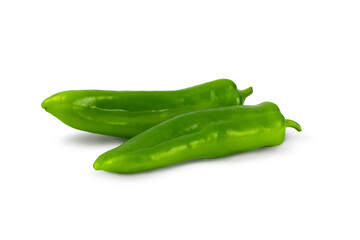 Two fresh green pepper isolated on a white background