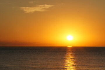 Sunrise over the calm sea