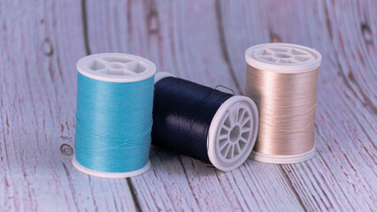 closeup of several sewing thread