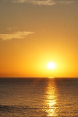 Sunrise over the calm sea