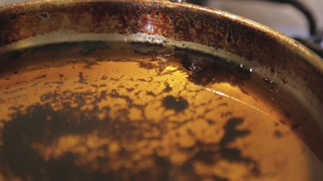 Frying pan with hot oil. Fatty foods represent an increase in the risk of heart disease such as: heart attack, heart failure and coronary heart disease.