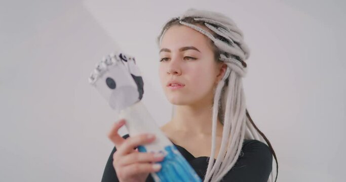 The girl is controlling bionic hand Bionics Cybernetic Robotic-arm Hand prosthesis