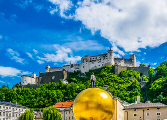 the festung Hohensalzburg fortress with the Sphaera sculpture situated on the Kapitelplatz in the...