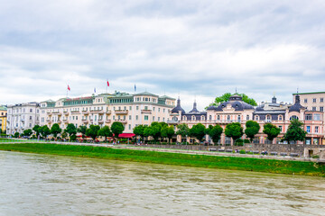 View of riverside of Salzach river in Salzburg, Austria.