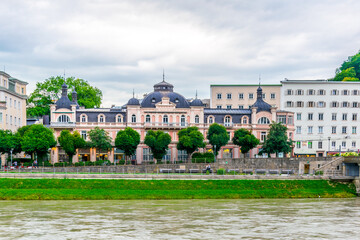 View of riverside of Salzach river in Salzburg, Austria.