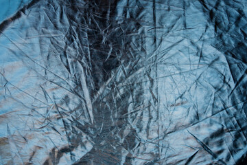 The texture of the foil is silvery mirror color. Copy space.