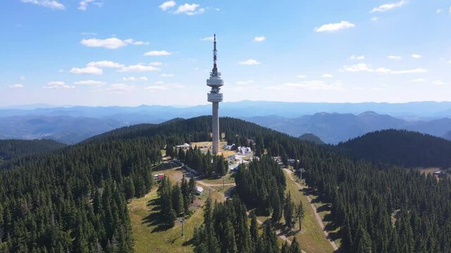 Aerial view of Rhodope Mountains and Snezhanka tower near resort of Pamporovo, Smolyan Region, Bulgaria