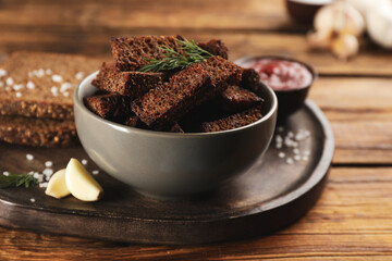 Delicious hard chucks in bowl on wooden table