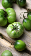 Green tomatoes on a wooden surface. Harvest the tomato. Green tomatoes for fermentation.