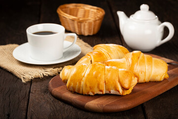 Traditional fresh baked croissants on the table.