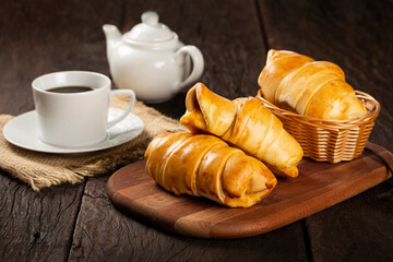 Traditional fresh baked croissants on the table.