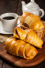 Traditional fresh baked croissants on the table.