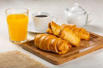 Traditional fresh baked croissants on the table.
