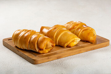 Traditional fresh baked croissants on the table.
