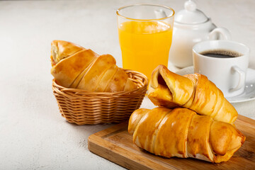 Traditional fresh baked croissants on the table.