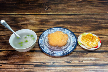 Chinese family breakfast, eggs, pea porridge and cake.