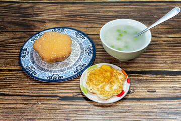 Chinese family breakfast, eggs, pea porridge and cake.