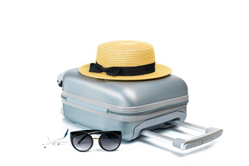 Travel suitcase isolated. Travel accessories with suitcase, straw hat, toy airplane in minimal trip vacation concept isolated on white background. Design of summer vacation holiday concept.