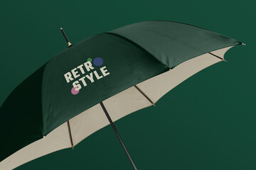 Green umbrella in retro design closeup