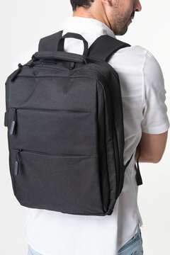 Man With Black Laptop Backpack Rear View Studio Shoot