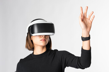 Woman playing a virtual video game on virtual screen