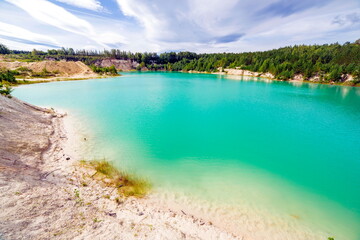 beautiful turquoise color of water in a kaolin quarry near the city of Kyshtym, Chelyabinsk region...
