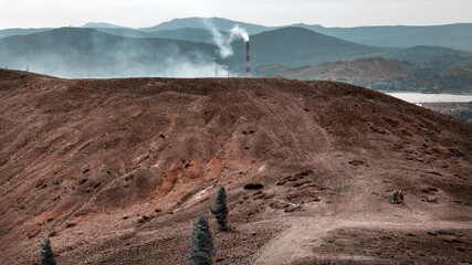 Mining lifeless dumps after quarrying in the city of Karabash, Chelyabinsk region in Russia