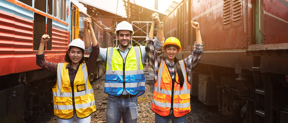 Portrait of the Rail Systems industrial workers with the Locomotive.