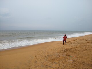 Fishermen pulling fishing net, fishing industry, kerala coast