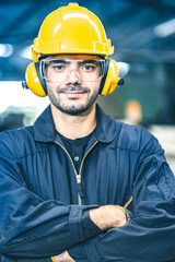 Industrial Engineers in Hard Hats.Work at the Heavy Industry Manufacturing Factory.industrial...