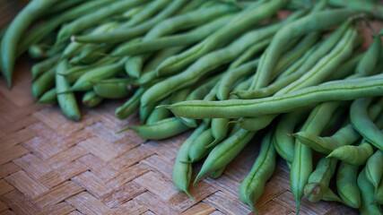 green beans on a wooden background