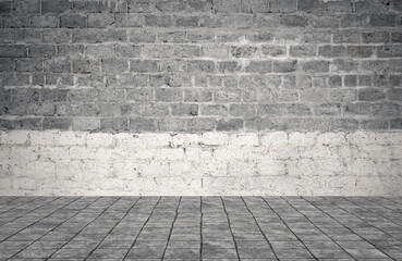 Empty room with bricks wall and tiled floor.