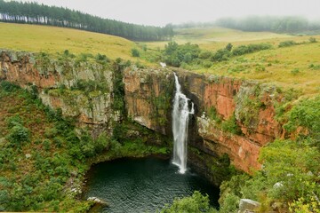 waterfall in autumn forest