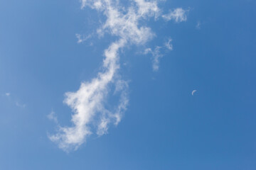 Soft white clouds texture on beautiful afternoon sky background. Image for background design The clear sky makes you feel fresh and clear.