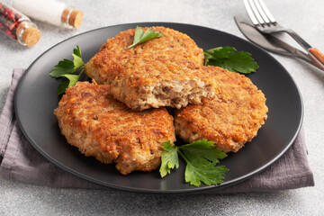 Buckwheat cutlets with cheese and parsley on a plate. Healthy diet food