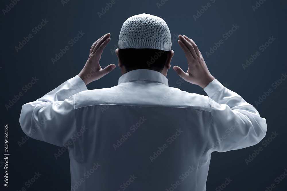 Wall mural religious asian muslim man praying