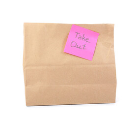 Paper bag with sticker TAKE OUT on white background