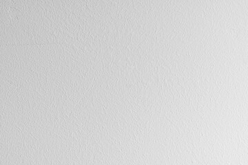 Fresh concrete wall in the construction site, white wall with cement floor, construction background renovation process, abstract