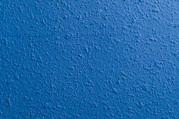 Fresh concrete wall in the construction site, blue wall with cement floor, construction background renovation process, abstract