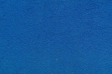 Blue plaster facade texture background. External facade of the building, plaster with clear texture.