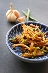 Dry Bombay duck fried with chili and garlic. Dried Bombay duck masala. also known as suke bombil masala in Marathi. Dried bombil chutney. Dehydrated bombil fish. Copy space.