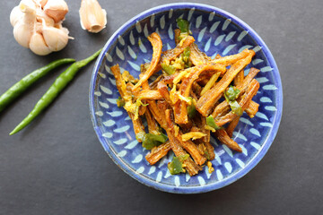 Dry Bombay duck fried with chili and garlic. Dried Bombay duck masala. also known as suke bombil masala in Marathi. Dried bombil chutney. Dehydrated bombil fish. Copy space.