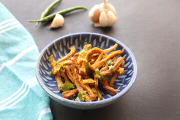 Dry Bombay duck fried with chili and garlic. Dried Bombay duck masala. also known as suke bombil masala in Marathi. Dried bombil chutney. Dehydrated bombil fish. Copy space.